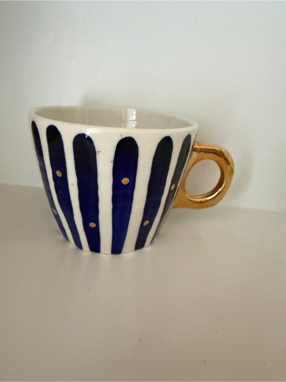 Anthropologie Hand-Painted Navy Stripe Ceramic Cup with Gold Handle